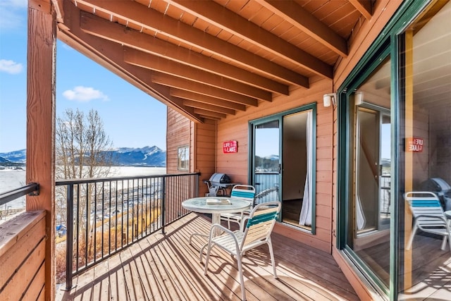 balcony featuring a mountain view