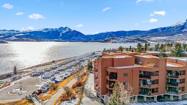 aerial view with a water and mountain view