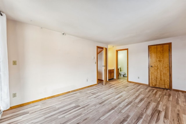 unfurnished room featuring light hardwood / wood-style flooring