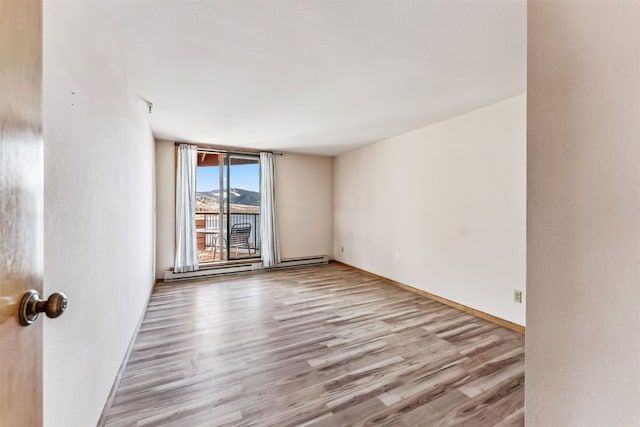 empty room with light wood-type flooring