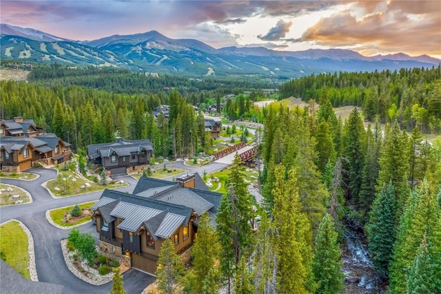 aerial view at dusk with a mountain view