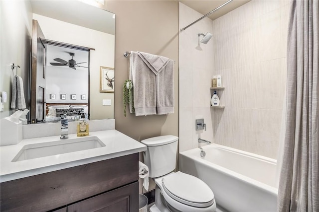 full bathroom with vanity, toilet, ceiling fan, and shower / bath combo with shower curtain