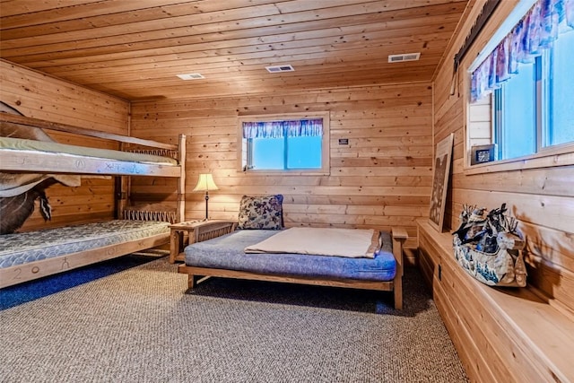 bedroom featuring wood ceiling, carpet flooring, wooden walls, a sauna, and multiple windows