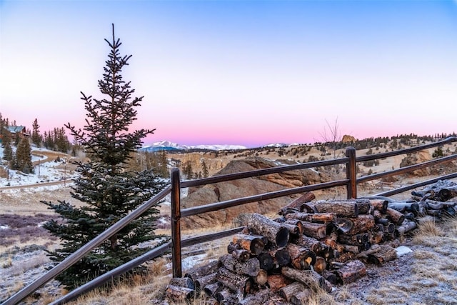 yard at dusk with a mountain view