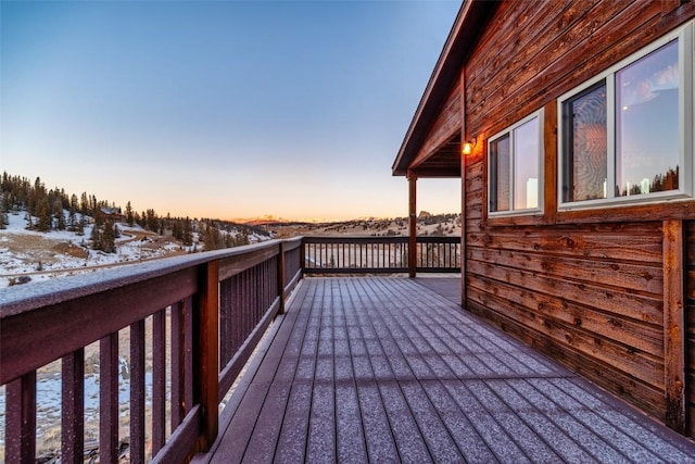 view of snow covered deck