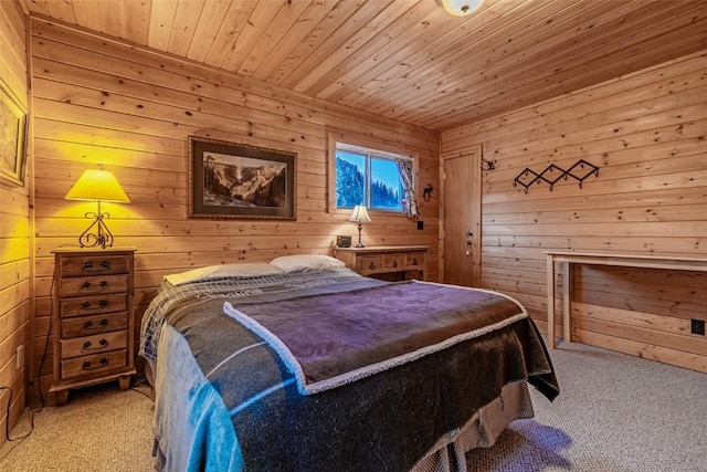 carpeted bedroom featuring wood ceiling