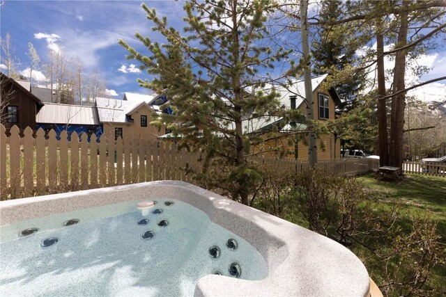 view of pool featuring a hot tub