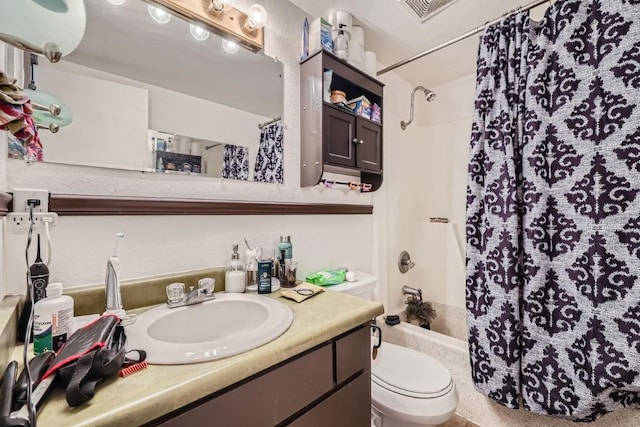 full bathroom featuring vanity, toilet, and shower / bathtub combination with curtain