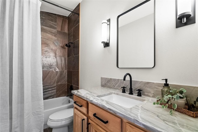 full bathroom featuring vanity, toilet, and shower / bath combo with shower curtain