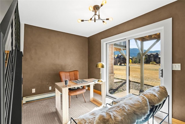 office area featuring a chandelier, a mountain view, and a baseboard radiator