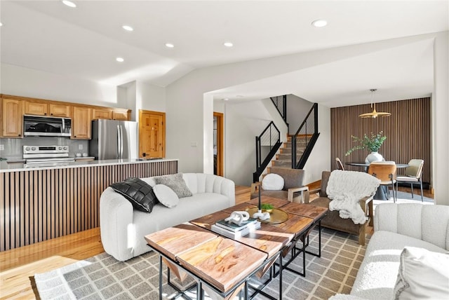 living room with lofted ceiling