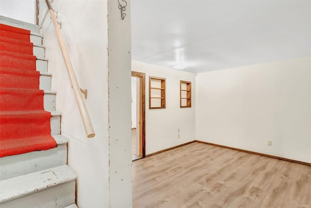 basement with wood-type flooring