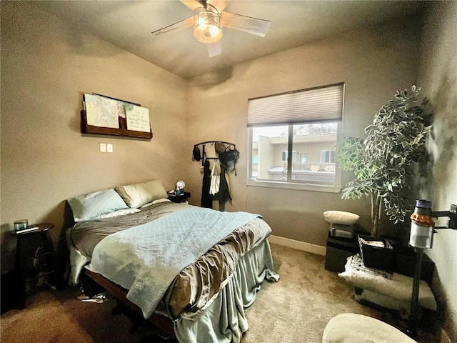 bedroom with carpet, baseboards, and ceiling fan