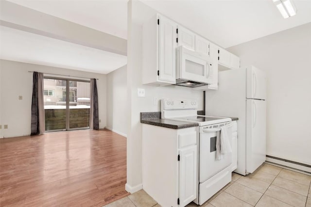 kitchen featuring light tile patterned floors, white appliances, white cabinetry, and baseboard heating