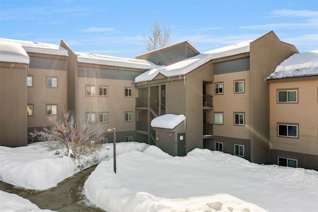 view of snow covered property