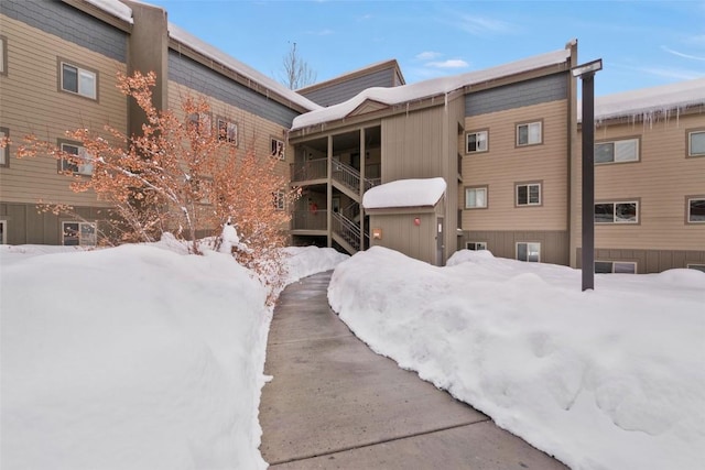 view of snow covered property