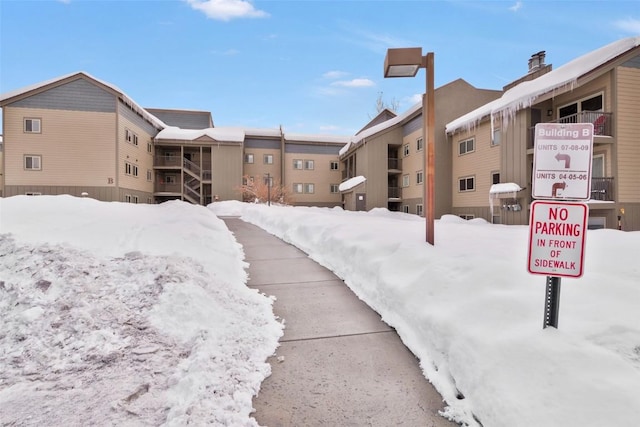 view of snow covered property