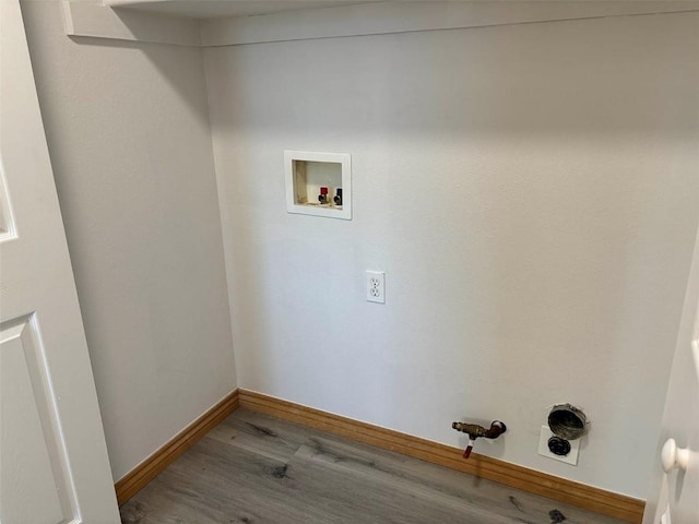 washroom with washer hookup, electric dryer hookup, gas dryer hookup, and hardwood / wood-style flooring