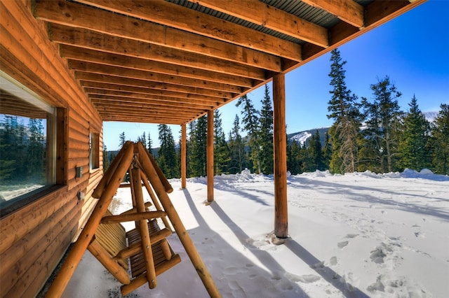 view of snow covered patio