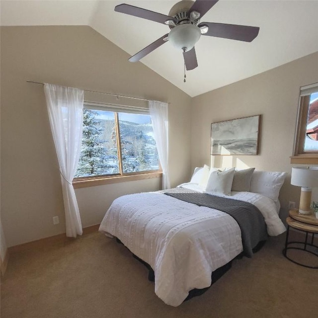 bedroom with carpet, lofted ceiling, and ceiling fan