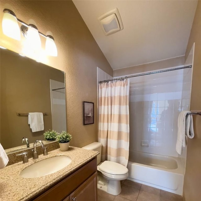 full bathroom featuring tile patterned floors, shower / tub combo, toilet, vaulted ceiling, and vanity