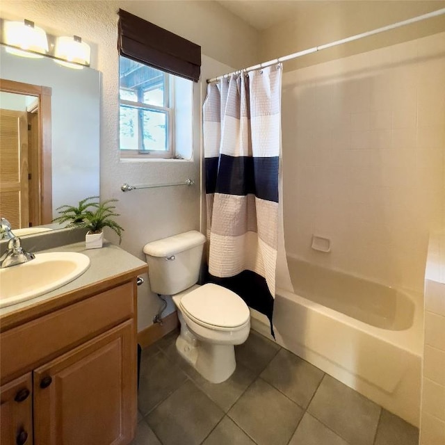 full bathroom with vanity, toilet, shower / bathtub combination with curtain, and tile patterned floors