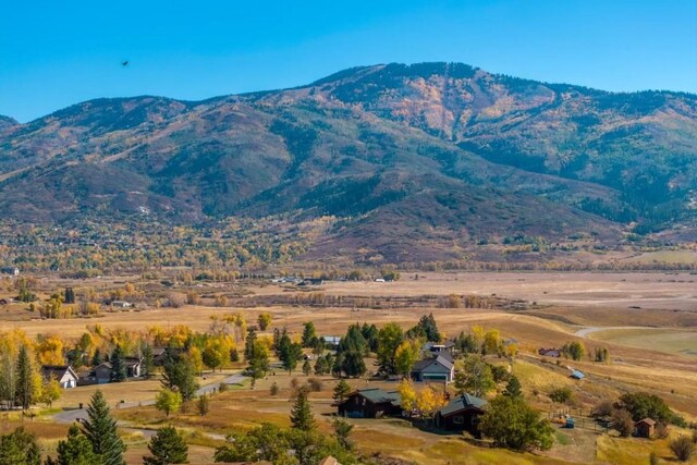 mountain view featuring a rural view