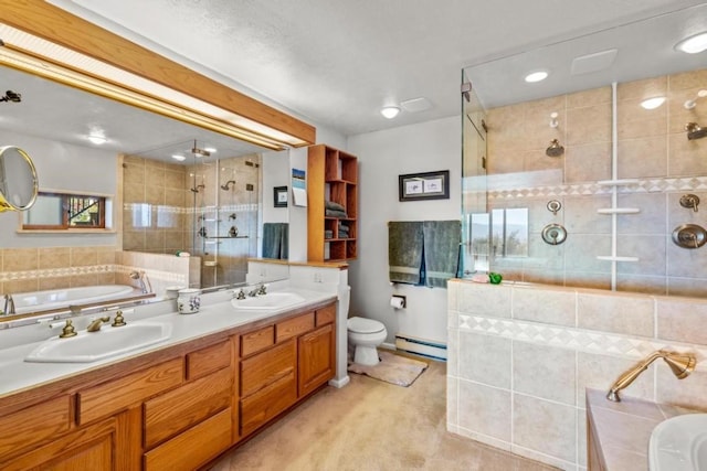 full bathroom with vanity, toilet, independent shower and bath, and a baseboard heating unit