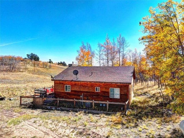 view of side of property featuring a rural view