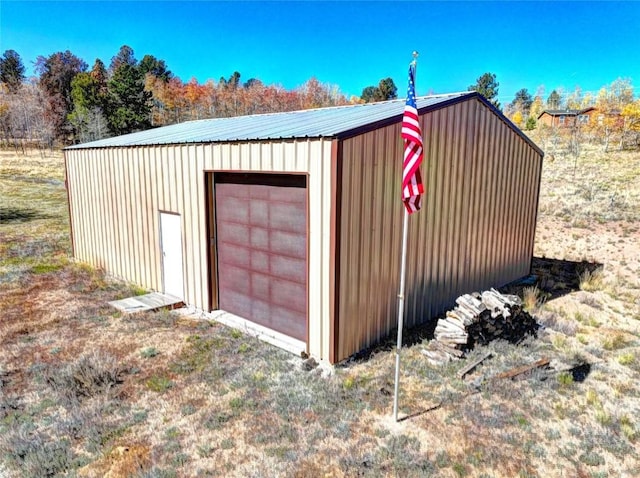 view of outbuilding featuring a garage