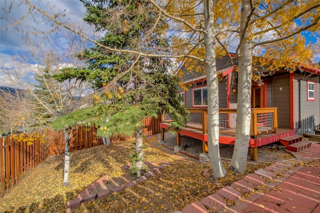 view of yard featuring a deck