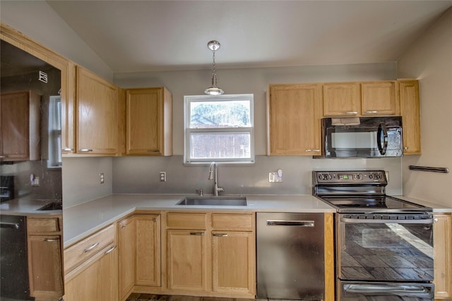 kitchen featuring sink, decorative light fixtures, decorative backsplash, light brown cabinetry, and black appliances