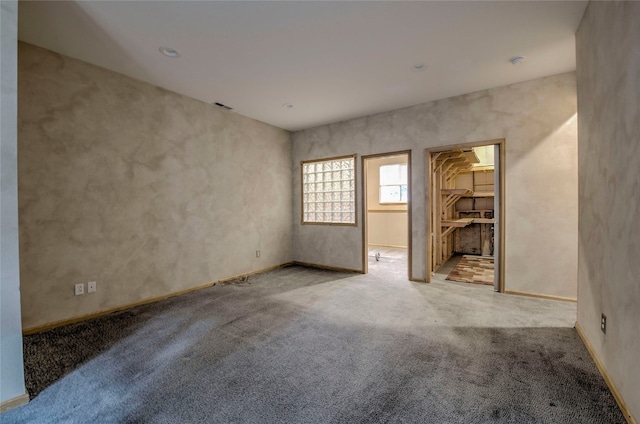 view of carpeted spare room