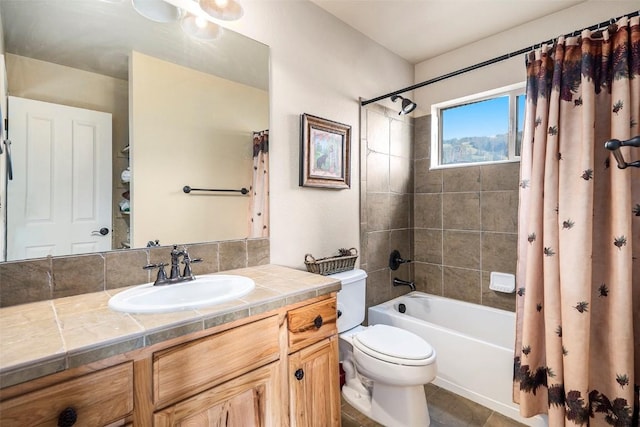 full bathroom featuring vanity, toilet, and shower / bathtub combination with curtain