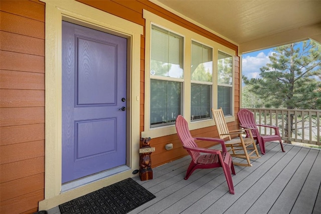 doorway to property with a porch