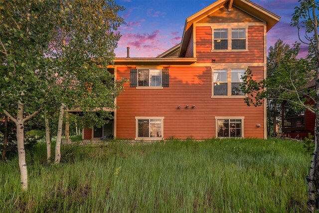 view of property exterior at dusk