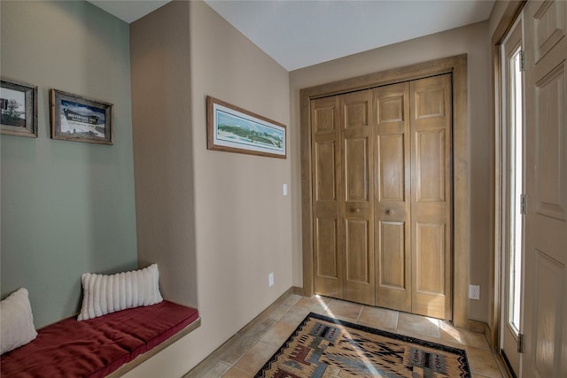 entrance foyer with light tile patterned floors