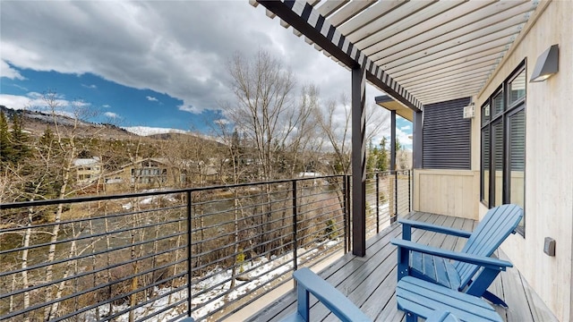 balcony featuring a mountain view