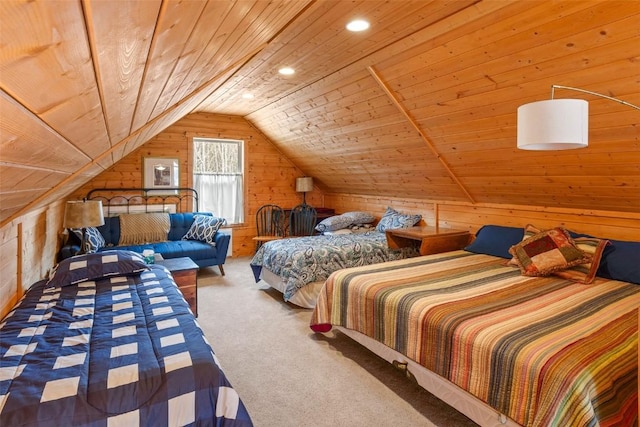 carpeted bedroom with vaulted ceiling, wood walls, and wood ceiling