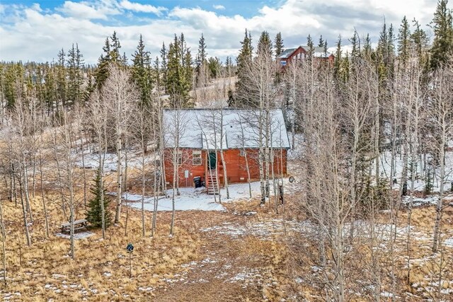 view of snow covered property