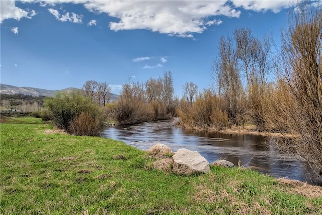 property view of water featuring a mountain view