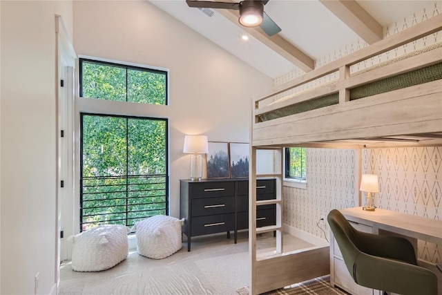 home office featuring high vaulted ceiling, beamed ceiling, and ceiling fan