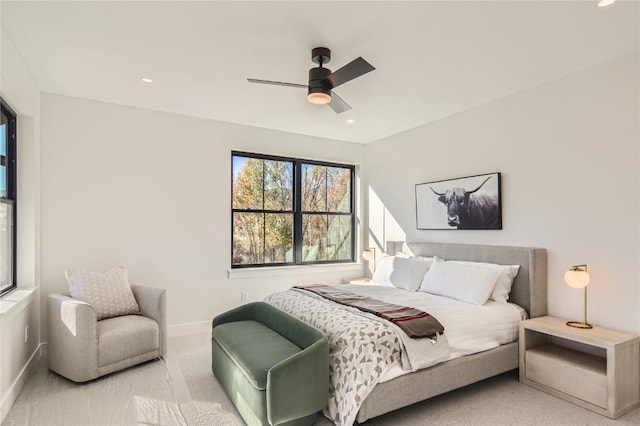 carpeted bedroom featuring ceiling fan