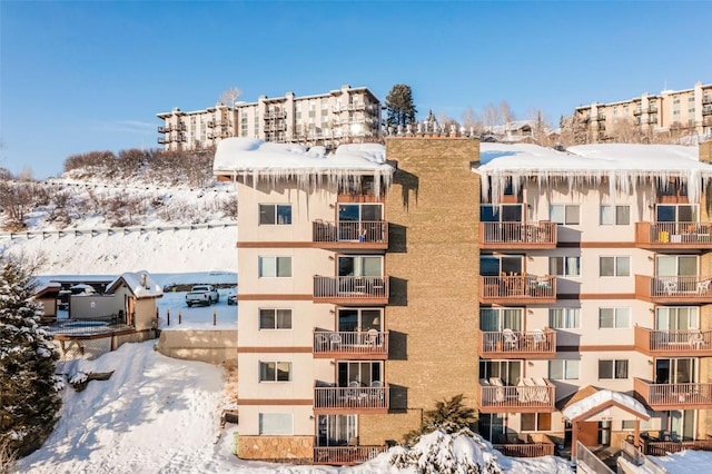 view of snow covered property