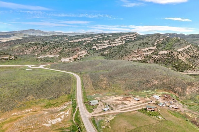 drone / aerial view featuring a mountain view