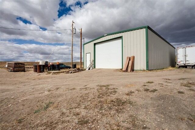 view of outdoor structure with a garage