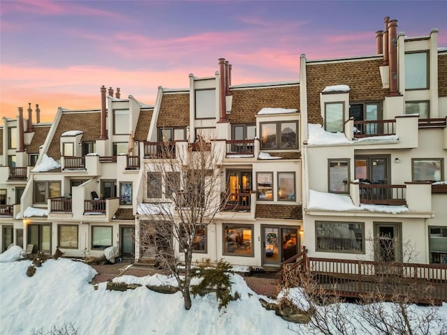 view of snow covered property