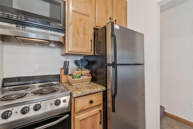 kitchen with light stone counters, extractor fan, baseboards, appliances with stainless steel finishes, and light brown cabinetry