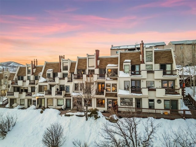 view of snow covered property