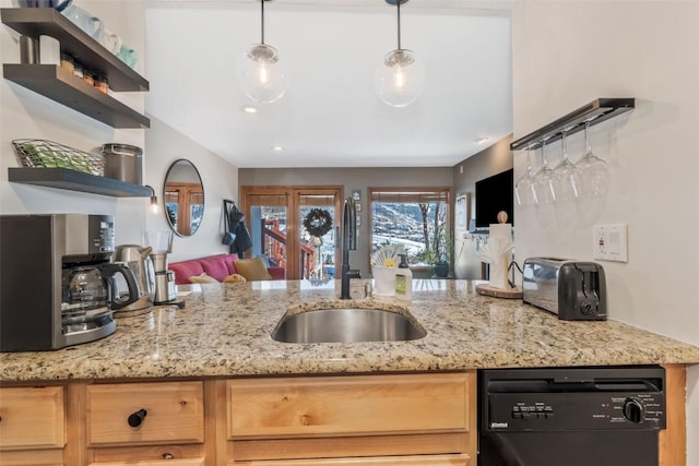 kitchen featuring light stone counters, a sink, open floor plan, dishwasher, and open shelves